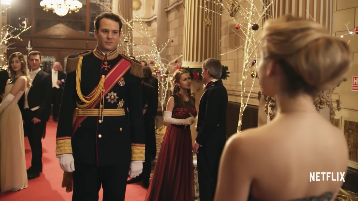 prince at ball looking at gril in dress